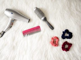 grey hair blower near pink hair combs and scrunchies