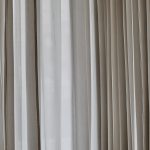 white and gray window curtain