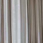 white and gray window curtain