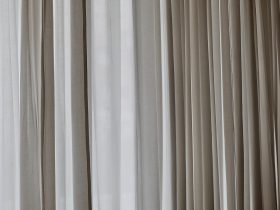 white and gray window curtain