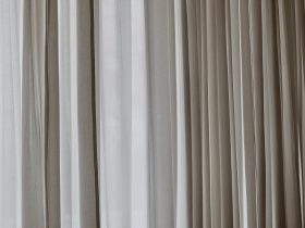 white and gray window curtain