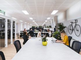 people sitting on black chairs