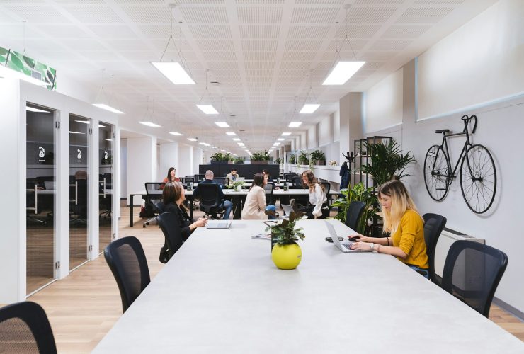 people sitting on black chairs