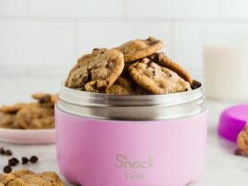 bunch of cookies in pink food container