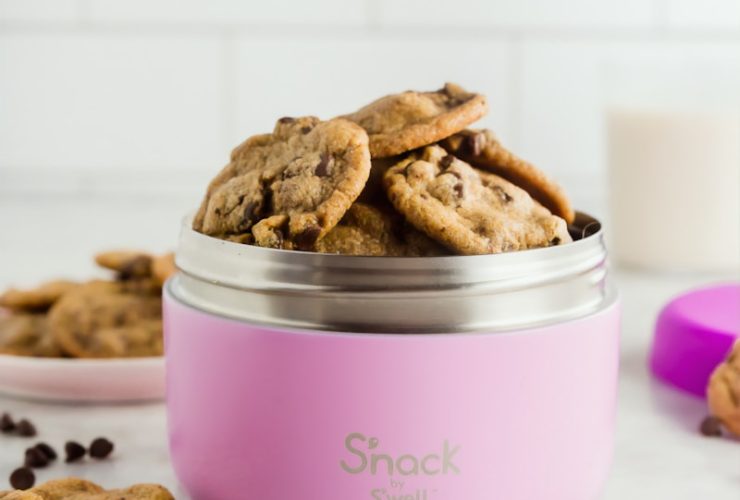 bunch of cookies in pink food container