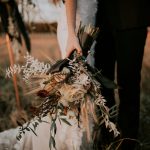 woman holding flower bouquet