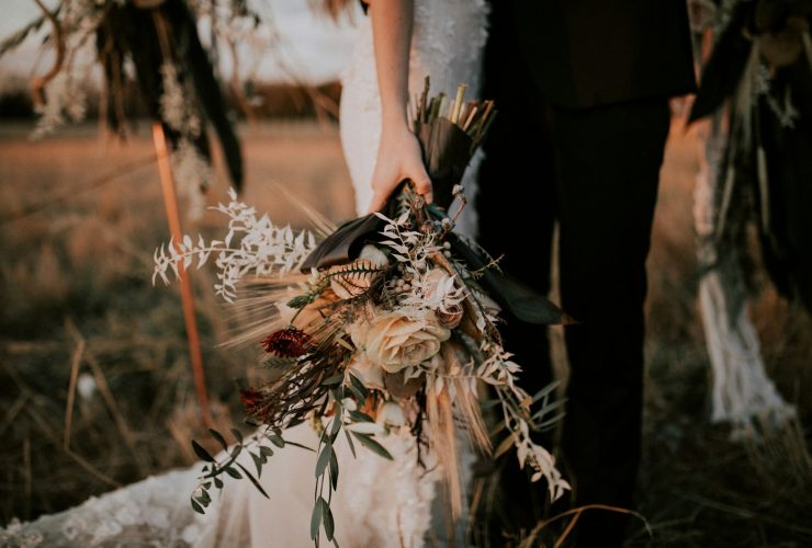 woman holding flower bouquet