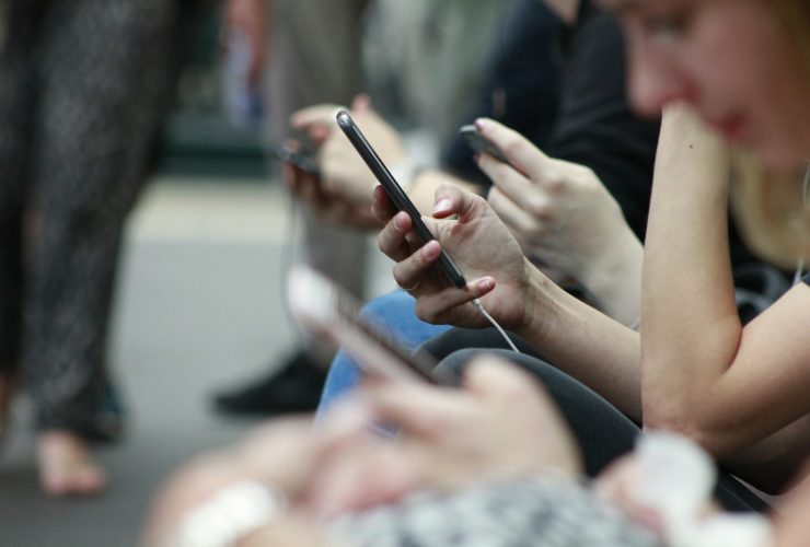 person holding black phone