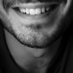 grayscale photo of mans face