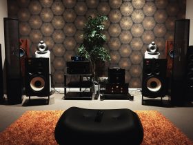 black and silver speakers on white table